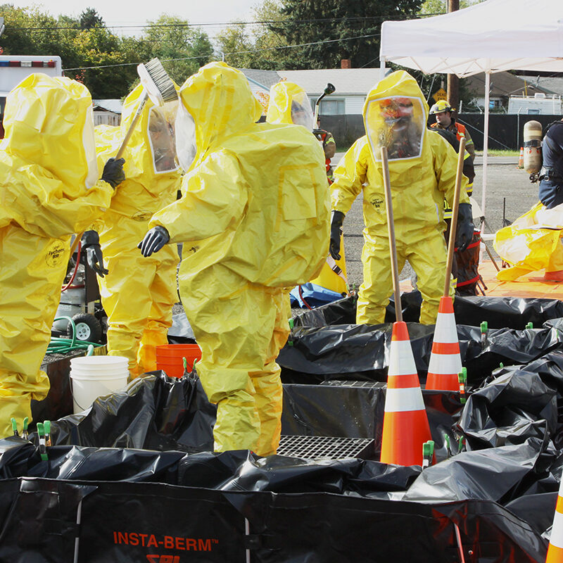 "Eugene, Oregon, USA aa November 3, 2011: Fire departments and emergency response teams will conduct disaster preparedness drills. This drill is the combination of various fire departments from Eugene, Lane County, and other nearby emergency services."